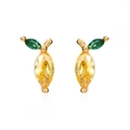 Macro detail of lemon-shaped stud earrings with yellow crystals and green leaf stones - Lemon