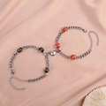 Pulseras magnéticas de corazón luminosas sobre seda rosa con cadena de eslabones cubanos - Negro y Rojo (Par)