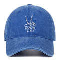 Close-up of GOOD VIBES hand gesture embroidery on washed blue cotton baseball cap - One Size / Dark Blue