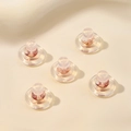 Detail of five 18K rose gold and clear silicone earring backs for jewelry making - Rose Gold