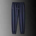 Pantalones deportivos azul marino para hombre con cordón elástico y bolsillos con cremallera - L / Azul Marino / Pierna Con Puño