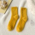 Warm yellow thickened faux mink velvet floor socks displayed on a white knit background - One Size / Yellow