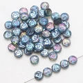 Macro shot of 10mm dark blue iridescent glass rose beads for DIY jewelry making - Transparent Blue