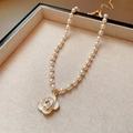French vintage style camellia flower pearl necklace with a purple rhinestone pendant - Camellia Shape Pearl Necklace (HN760-16)