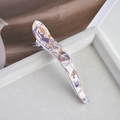 Macro detail of acetate duckbill hair clip with purple and beige marble pattern - 6# Purple Patterned Curved Horn Clip
