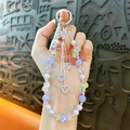 Handmade heart beaded phone charm with purple pearls and iridescent crystals - Purple