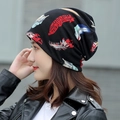 Black knit beanie hat with colorful feather print pattern for winter warmth - Standard / Dreamy Feather Black