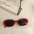Red oval frame children's sunglasses with black lenses and UV400 CE protection - Transparent Red Gray Lens
