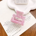 Pink marble acetate hair claw clip with square hollow design on floral magazine backdrop - Gem Pink