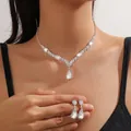 Detail of silver waterdrop crystal necklace and earrings set worn for elegant evening events - Silver White Crystal Necklace And Earrings (JXTL21151)