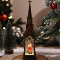 Détail de lanterne église vintage avec Père Noël et paillettes dorées tourbillonnantes - Style Injection d'Eau-Père Noël