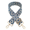 Detail of blue and beige geometric diamond pattern woven bag strap with gold metal hooks - Beige and Ocean Blue