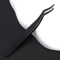 Close-up of black curved stainless steel eyelash tweezers with professional matte finish - Black