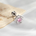 Floral stud earring featuring a pink center gem and clear drop-shaped crystals - A1100-2# Pink (Single Piece)