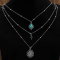 Detail of bohemian layered necklace with turquoise drop and silver mandala charm - Teardrop/Cross/Mandala Style (11213)