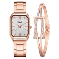 Detail view of rose gold rectangular watch with silver sunray dial and rhinestone bracelet - White Watch + Bracelet