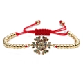 Adjustable gold beaded bracelet with colorful snowflake zircon charm and red cord - Red Rope