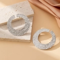 Silver geometric hoop earrings with hammered texture and oversized metallic design - Round Hammered Texture / Silver