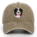 Detailed embroidery of a Bernese Mountain Dog on a vintage washed cotton baseball cap - Khaki