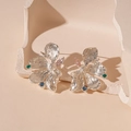 Close-up of flower earrings with vintage pleated metal texture and colorful rhinestones - Silver Wrinkled Flower Style (Silver Earring Post)