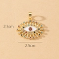 Detailed view of gold devil's eye pendant with colorful zircons and size markings - Gold Enamel Evil Eye with Red Iris Pendant (O)