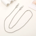 Detailed view of a silver metal ball chain strap with lobster clasps on a clean background - K371-6mm Bead Chain + Gate Buckle Silver