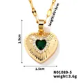 Detail showing heart-shaped green zircon pendant with sunburst texture and dimensions - Gold - Green Zirconia