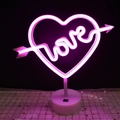 Pink neon heart lamp with 'love' text on white base for festive Christmas decoration - Pink Heart with Love