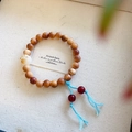 Ethnic wooden bead bracelet with cat paw accent and blue tassel on display card - Single Circle Bracelet (1017-8#)