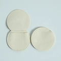 Detail of round beige microfiber jewelry pouch in both open and closed positions - 7*7cm / Off-white