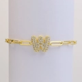 18k gold paperclip chain bracelet featuring a sparkling crystal-encrusted letter W charm - Letter W
