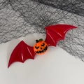 Halloween red bat wing hair clip featuring an orange pumpkin design with dark aesthetics - Red Pumpkin