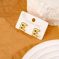 Polished gold-plated stainless steel stud earrings featuring the letter E shape - Letter E