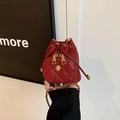 Mini burgundy drawstring bucket bag with camellia ornament and chain strap - Burgundy