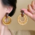 Macro detail of Bohemian round raffia woven earrings with tortoiseshell resin accents - 7# Silver Needle-Coffee (Round Hollow)