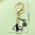 Schattige zwarte kat sleutelhanger met gouden ring en muzieknoten bedeltjes 8,2 cm - Muzieknote Staff Kat (LS212) / 8.2x3cm