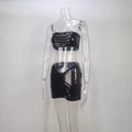 Detailed view of shiny black PVC crop tube top and bodycon mini skirt with glossy texture - S / Black