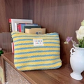 Fuzzy plush travel makeup bag featuring yellow and blue stripes with a soft texture - Yellow and Blue Stripe