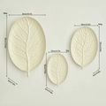 Three-piece leaf-shaped decorative tray set in cream white with realistic vein textures - Cream
