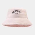 Detailed close-up of pink bucket hat with BABY GIRL 90'S embroidery and warm fleece lining - M (56-58cm) / Pink