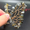 Detailed view of handmade butterfly hair claw with grey-blue natural stones and gold metal - Labradorite Gold Butterfly