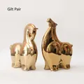 Minimalist gold-plated ceramic horse figurines set with a glossy metallic mirror finish - Gold-plated Pair