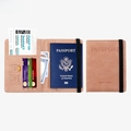 Pink RFID blocking passport wallet holder with multiple card slots and elastic strap - Elastic Band Style / Pink