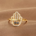 Golden Hamsa hand open ring with blue evil eye and sparkling zircons on silk background - Hamsa Hand Style (Q-J089) / Gold