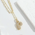 Gold double-layered necklace featuring a crystal-encrusted letter P pendant - Letter P