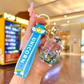 Luminous unicorn keychain with blue liquid star bottle, silicone strap and gold bell charm - Black Luminous Bubble Bead Gas Tank