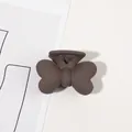 Detail view of a matte brown butterfly hair claw clip featuring rounded wings and teeth - 4cm Butterfly-Dark Coffee