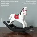 White handcrafted wooden rocking horse ornament with vintage hand-painted details - White
