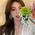 Detail of handmade beaded flower earrings with white tassels on a model for display - 9# 925 Sterling Silver Earring Post-Green Blue-White Tassel (HE24970)
