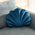 Shell shaped decorative throw pillow in navy blue velvet fabric on a grey sofa - 28x38x10cm / Navy Blue